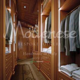 opulent-walk-in-wardrobe-adorned-with-gold-accents-for-the-ultra-rich