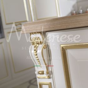 contemporary kitchen pantry with gold and white lacquers