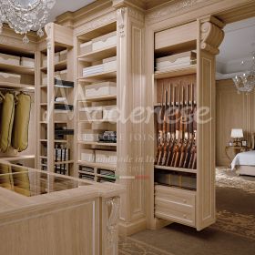 Traditional walk-in closets with concealed compartments optimize spaces with impeccable design