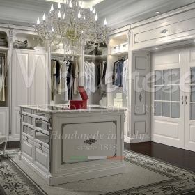 high-end walk-in closets with a contemporary feel with silver finishes